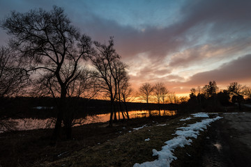 Wall Mural - sunset over the river Daugava