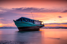 Fishing Boat On Tropical Beach In Beautiful Sunset Background, Thailand.