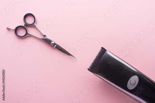 Fotografie, Obraz clippers, hair clippers, hair scissors, haircut accessories on pastel pink backg