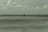 Fototapeta Fototapety z morzem do Twojej sypialni - Barrel mooring, hawser. Chlopy City in Poland. View on the sea from beach side. Polish Baltic Sea 2013