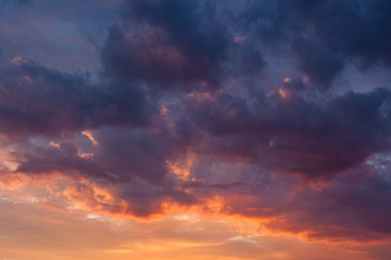 Fiery vivid sunset sky clouds