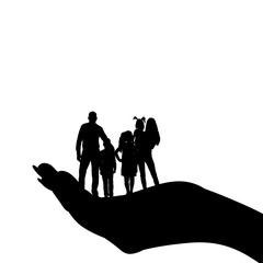 Wall Mural - silhouette of a family with children in the palm of your hand, caring