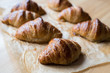 Homemade whole wheat croissants on baking paper