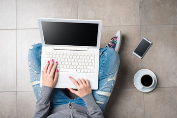 Wall Mural - Woman using white computer