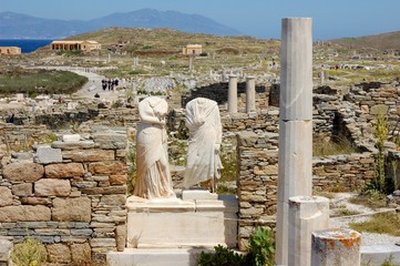 Wall Mural - Marble ruins of ancient city/ House ruins of ancient Athenians: Cleopatra and Dioscoride. And remains of a monument to them. Island of Delos, Cyclades, Greece. Near island of Santorini. On  tour