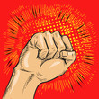 Pop art vector illustration.Fist hitting or punching