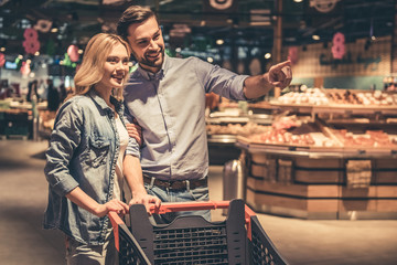 Wall Mural - Couple at the supermarket