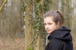 © Cora Müller - in the forest / A pretty girl in the forest looks back