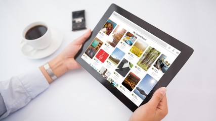 Poster - Composite image of man using tablet pc