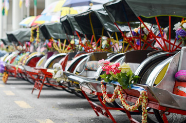 Vintage Trishaw stop beside road for service traveller