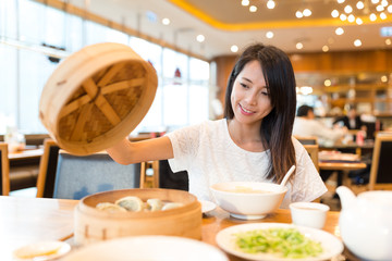 Sticker - Young Woman enjoy meal in chinese restaurant