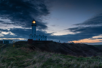 Wall Mural - light on flamborough head lighthouse / flamborough head is an eight mile long promontory on the york