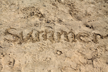 Sand background with inscription 