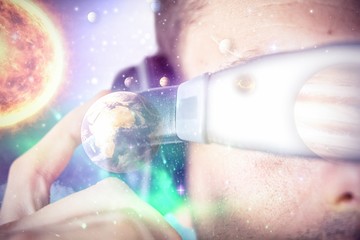 Poster - Composite image of close up of man using virtual reality 3d