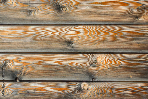 Plakat na zamówienie Brown weathered natural wooden desks with pattern background.