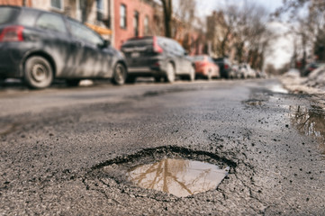 Large pothole in Montreal, Canada.