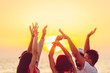 © FS-Stock - people dancing at the beach with hands up. concept about party, music and people
