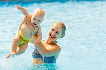 Poster - Mother and baby swim  in pool