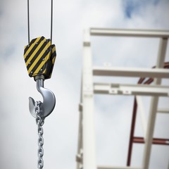 Poster - composite image of studio shoot of a crane lifting hook