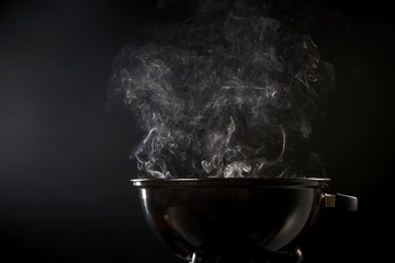 Smoke coming from a hot barbecue fire