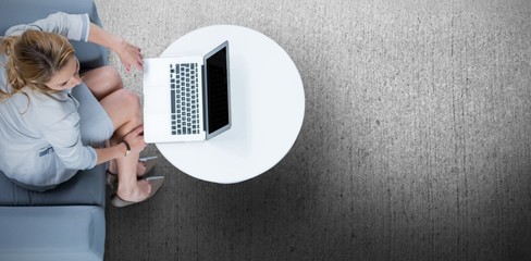 Poster - Composite image of woman on her laptop