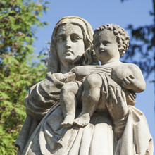 Statue Of The Virgin Mary With The Baby Jesus Christ  (Faith, Religion, Sin, Salvation Concept)