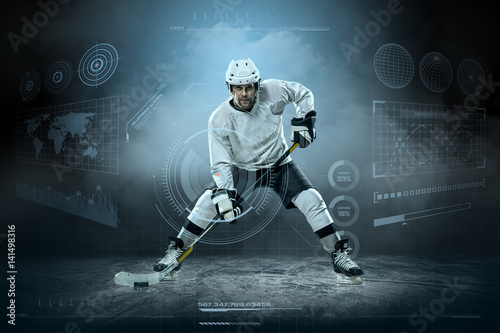 Fototapeta na szkło Ice hockey player on the ice around modern light