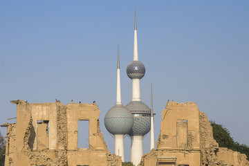 Kuwait towers view between ruins of old building