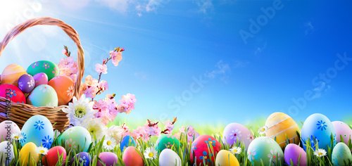 Easter Eggs In Basket And On Meadow