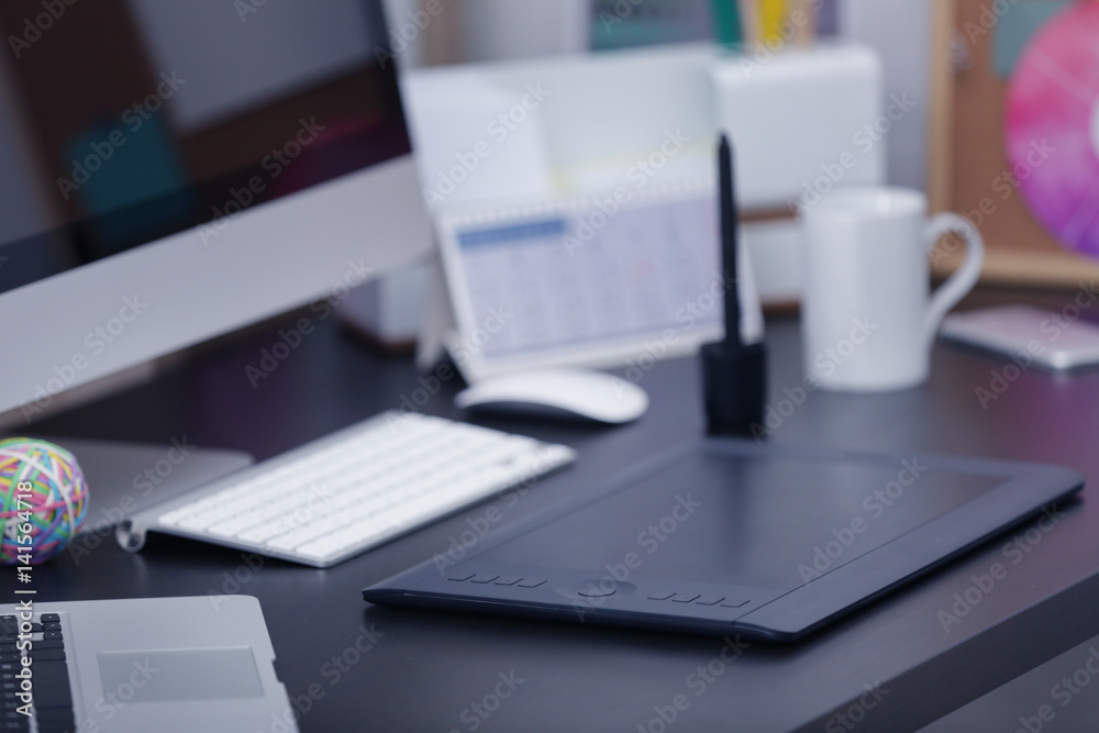 Modern workplace of designer with modern devices