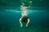 Fototapeta Łazienka - woman swim underwater
