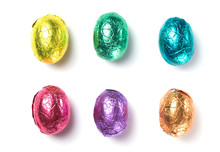Chocolate Easter Eggs Wrapped In Multi Colored Foil Isolated On White Background