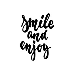 Smile and enjoy - hand drawn lettering phrase isolated on the white background. Fun brush ink inscription for photo overlays, greeting card or t-shirt print, poster design.