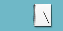 Open Notebook On White Background With A Pencil