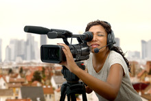 Young African American Women With Professional Video Camera