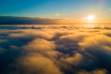 Wall Mural - Beautiful aerial view of the clouds during sunset or sunrise from above Hawaii islands