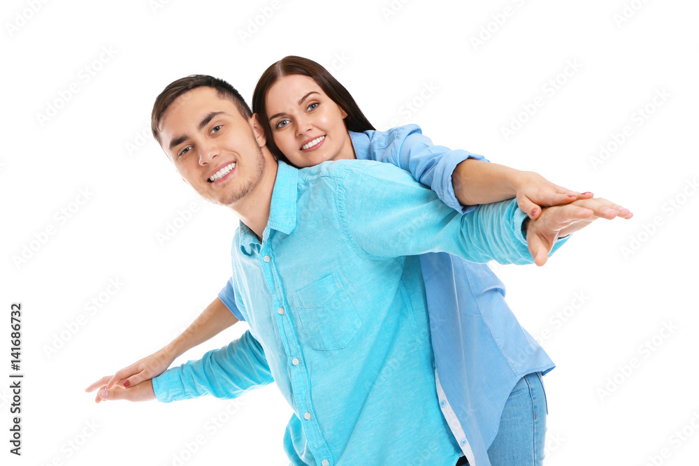 Happy couple having fun on white background