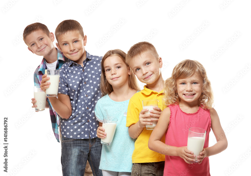 Children with glasses of milk on white background