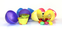 Assorted Colored Easter Eggs Open With Assorted Candy Inside