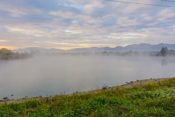 Wall Mural - Lake in the mountains for recreation and fishing. Early morning