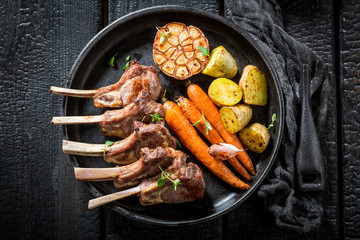 Tasty roasted lamb ribs with thyme and spices