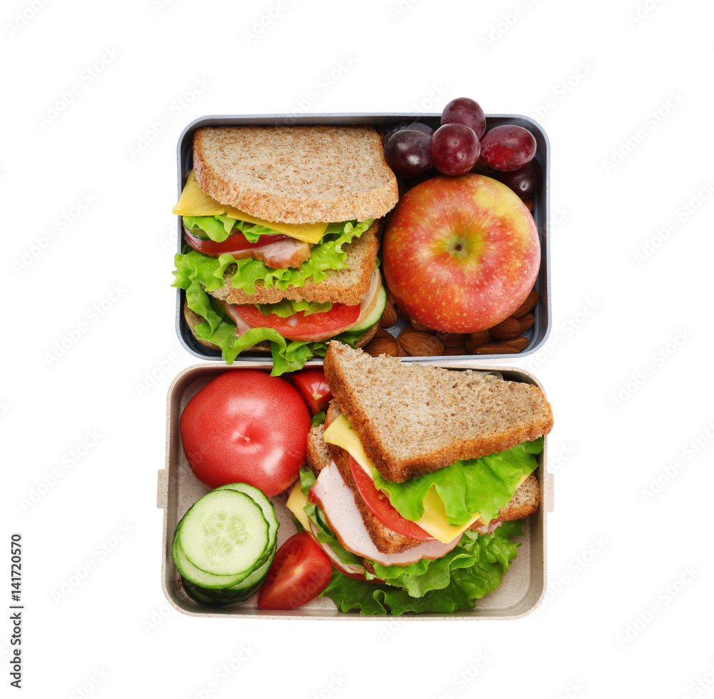 Lunch boxes with delicious food on white background