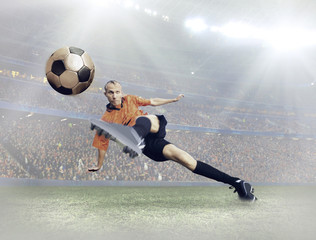 Wall Mural - Soccer player with ball in action on field of stadium