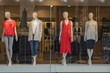 © agcreativelab - Women clothing store with mannequins in showcase