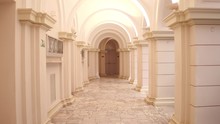 Lit Old Building Passageway And Columns