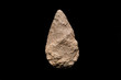 © herraez - Prehistoric human tool, Quartzite biface on black isolated background, 500.000 years old.