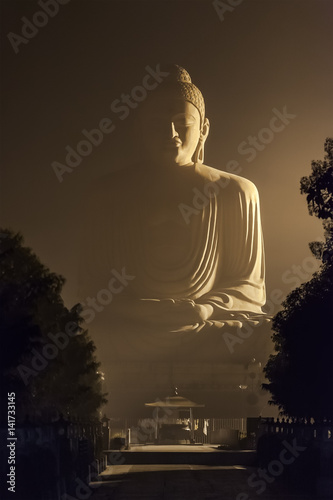 the giant buddha statue is one of the many stops in the buddhist pilgrimage and tourist adobe stock