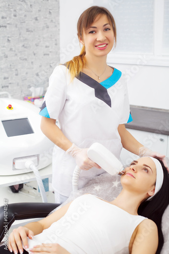 Body Care Laser Hair Removal Beautician Removing Hair Of Young