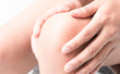 © mraoraor - Closeup woman hand hold knee with pain symptom, health care and medicine concept