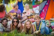 © WavebreakMediaMicro - Group of friends posing together at campsite